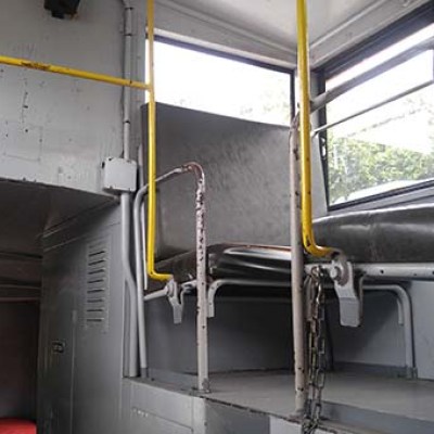 a train is parked on the side of a building