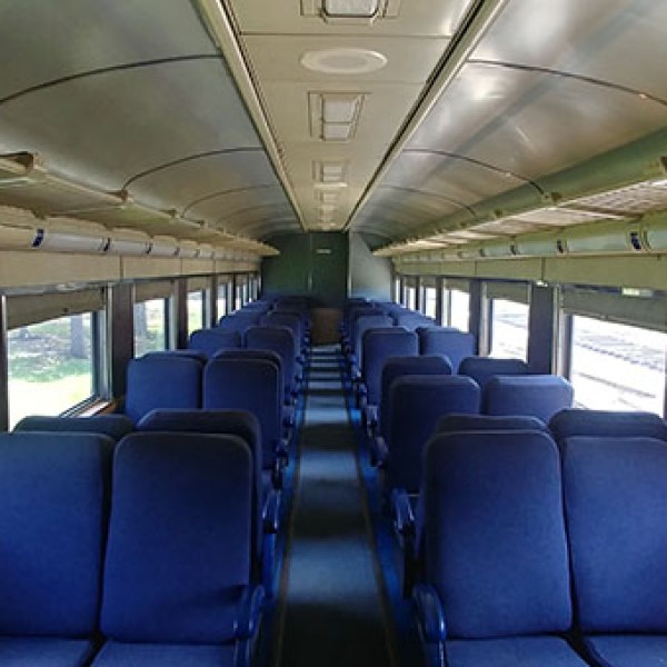 a room filled with furniture and a large window