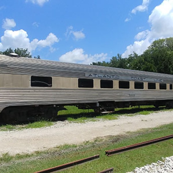 a large long train on a steel track