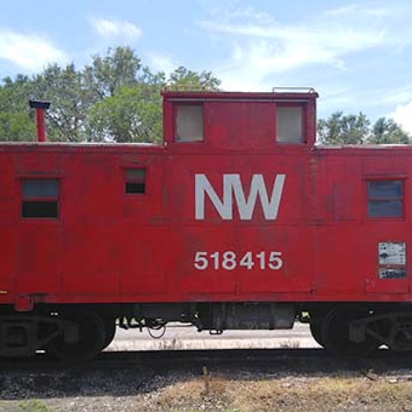 a truck that is sitting on a train track