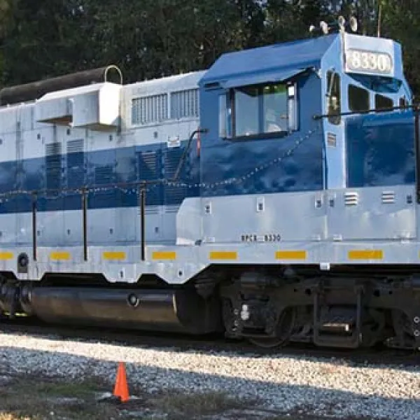 a truck that is sitting on a train track