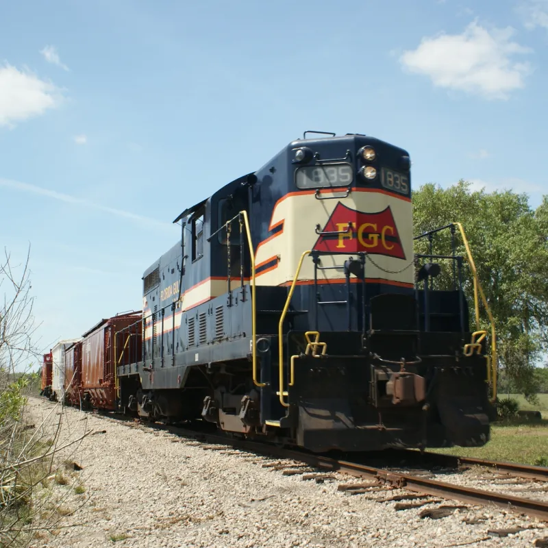 a train that is sitting on a railroad track