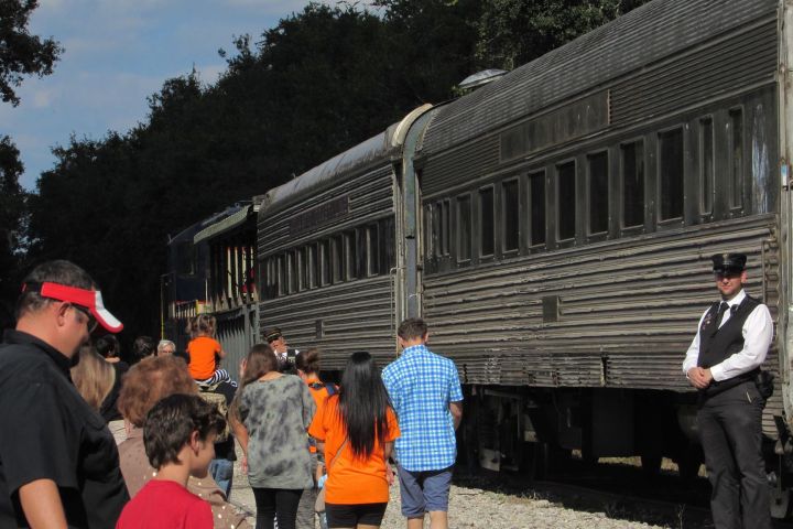 passengers boarding a train
