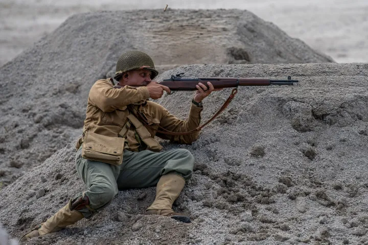 Allied soldier firing his rifle
