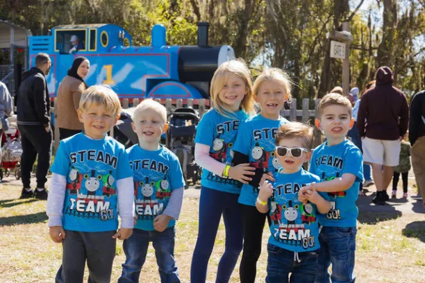 a group of people posing for the camera